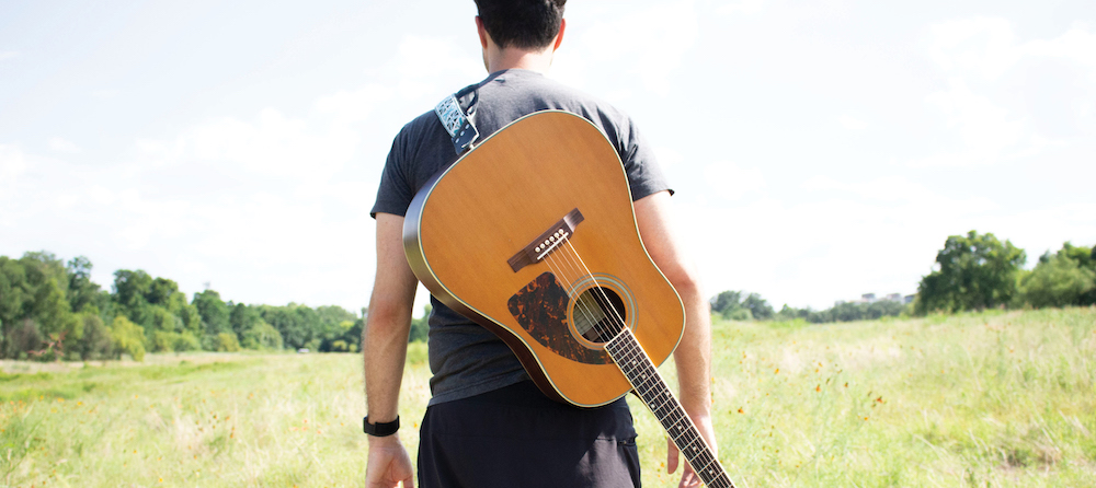 guitarist in field image